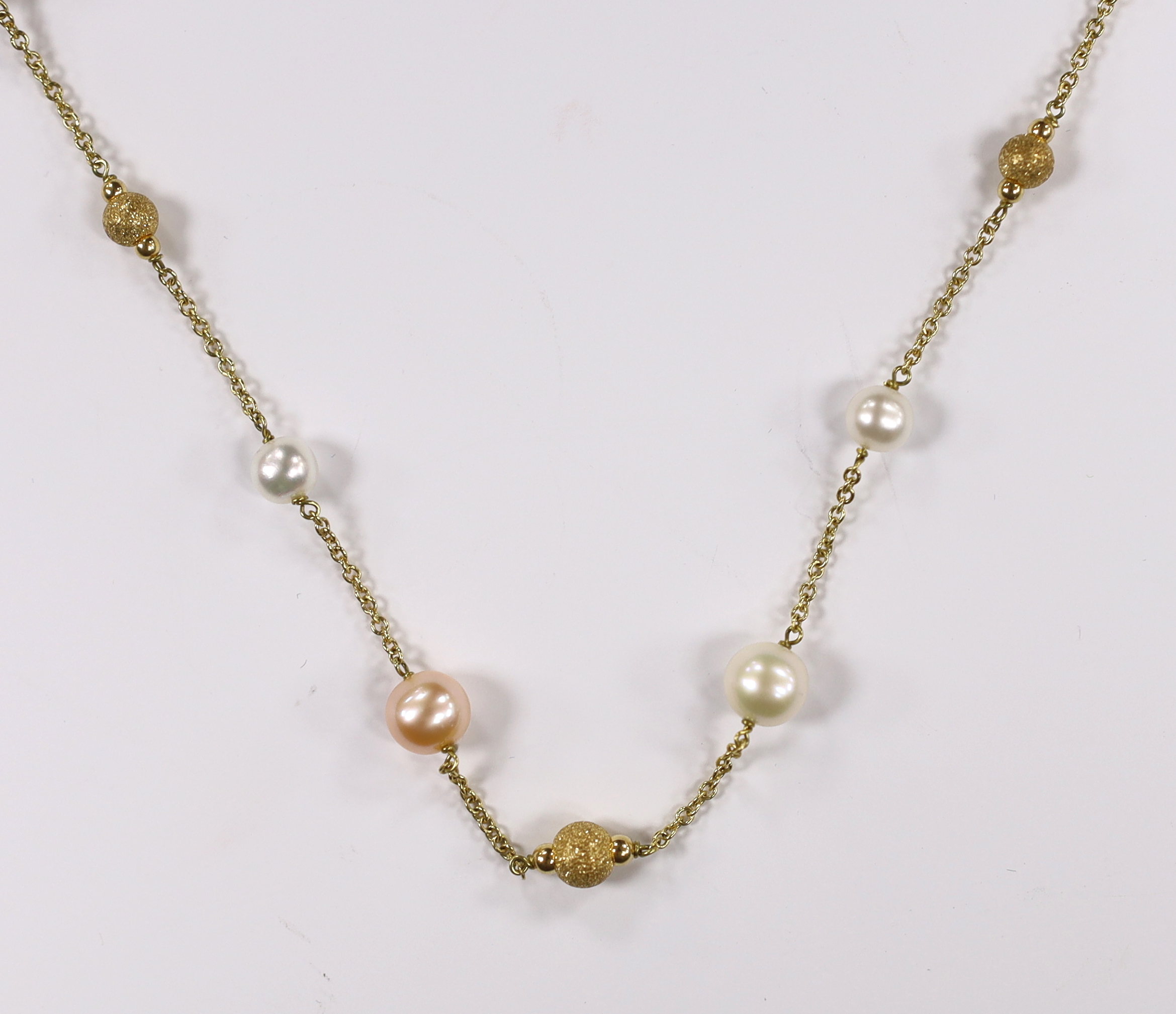 A modern Italian 18ct gold, twelve stone two colour cultured pearl and five gold sphere set necklace, 48cm, gross weight 13.4 grams.